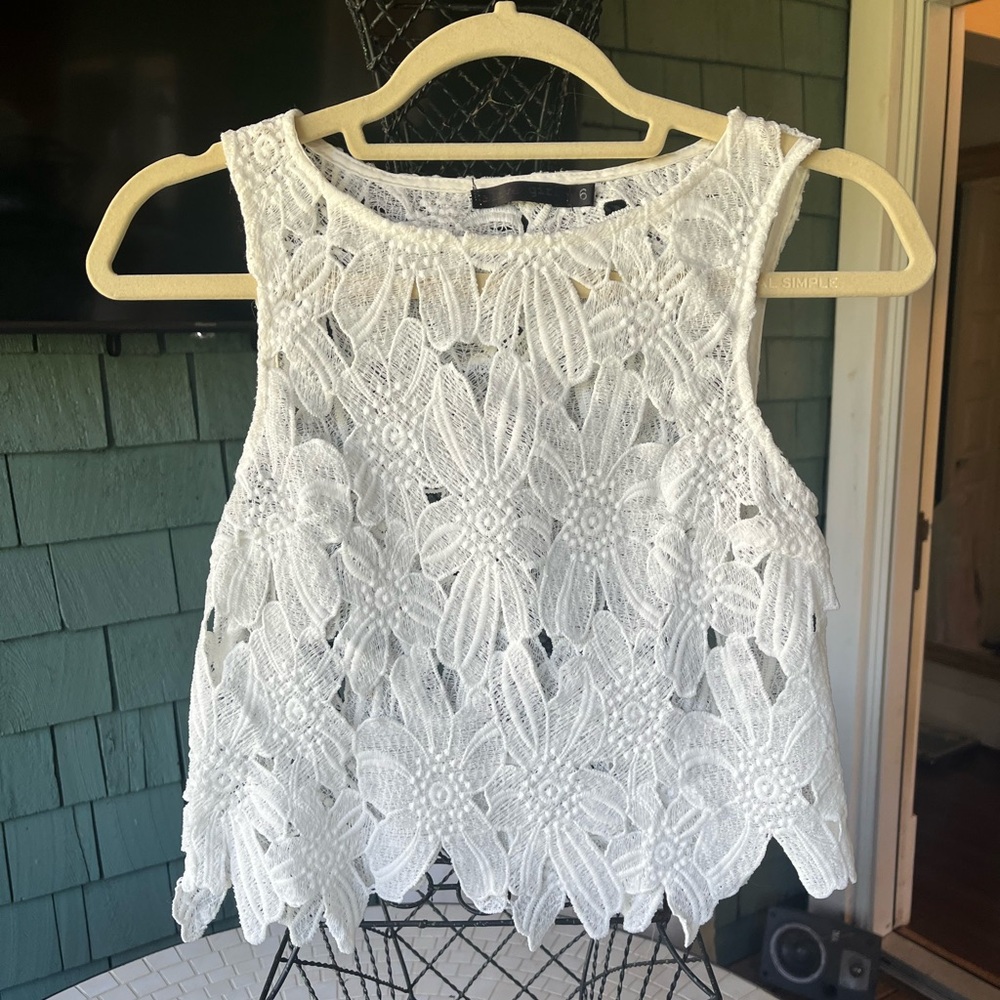 Cute cut out white crop top. Size 6. Great condition